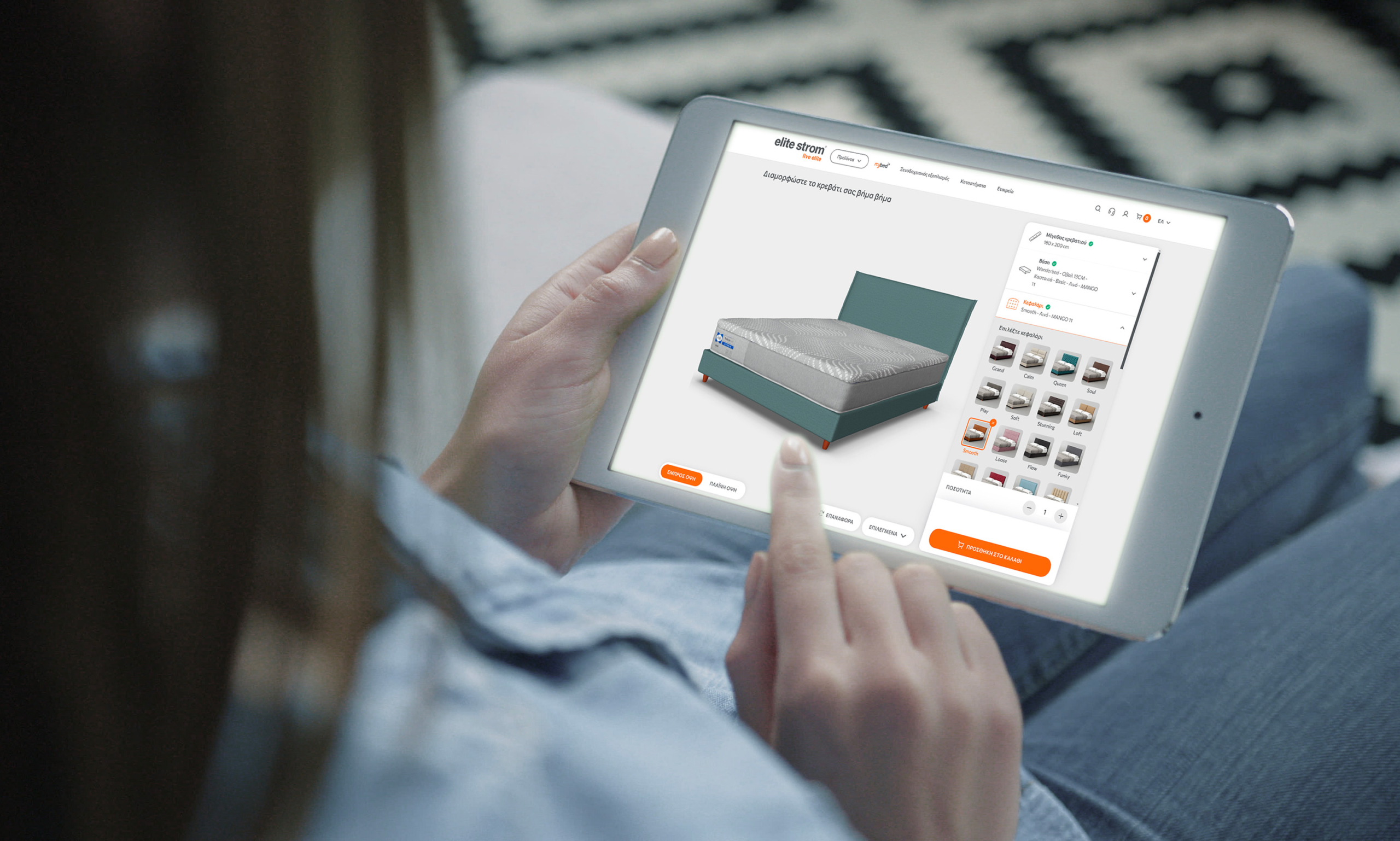 Woman browse an e-shop on tablet, uses a product configurator for e-commerce personalization, by selecting colors, textures, size and different attributes of a bed.